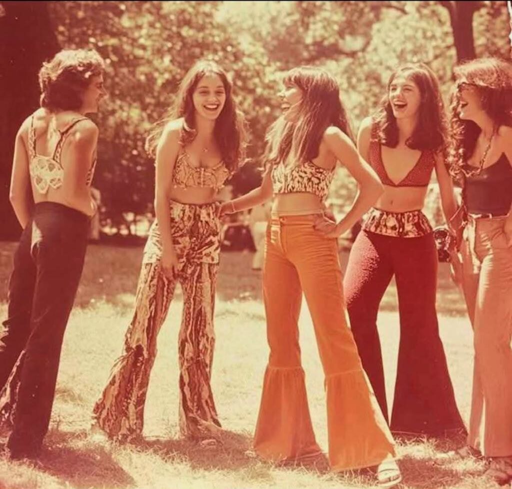 Teens wearing fashions popular in the 60s/70s