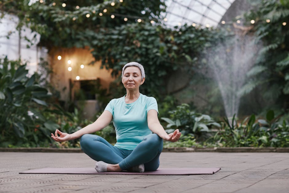 A serene scene of people meditating and exploring consciousness in a natural setting