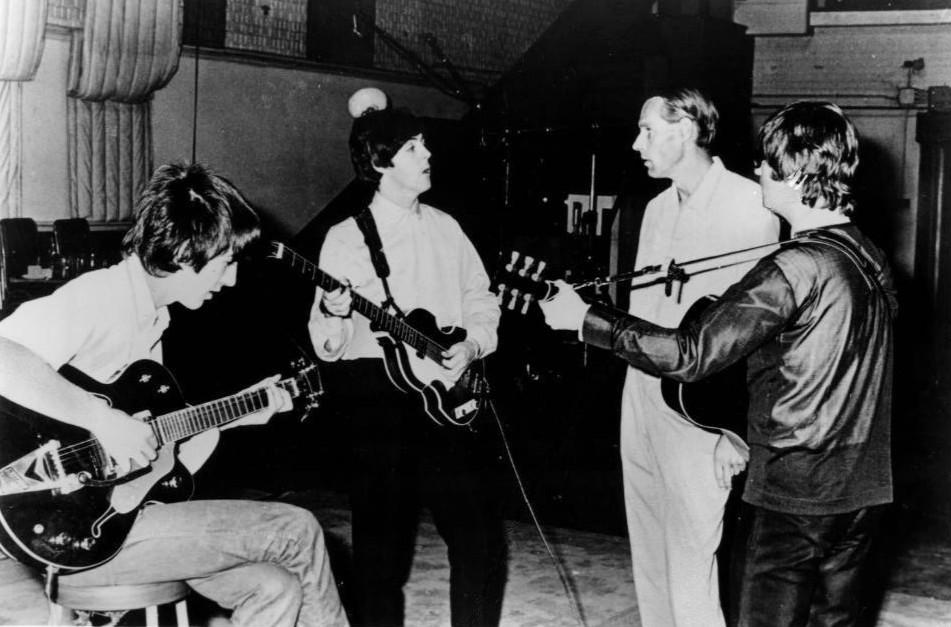 The Beatles experimenting with instruments and recording techniques in the studio