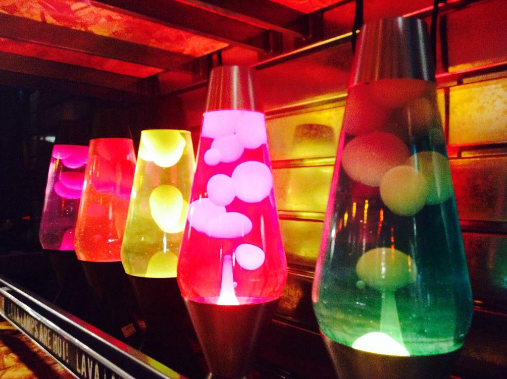 A series of lava lamps showing their evolution from the 1960s to the 1990s